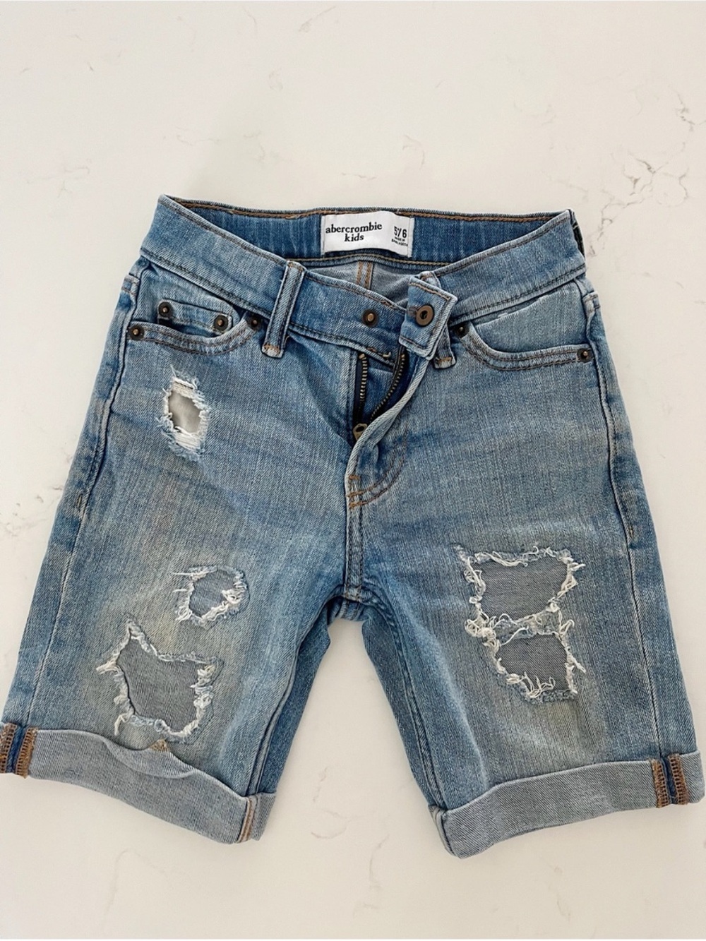 • Abercrombie kids distressed long shorts •